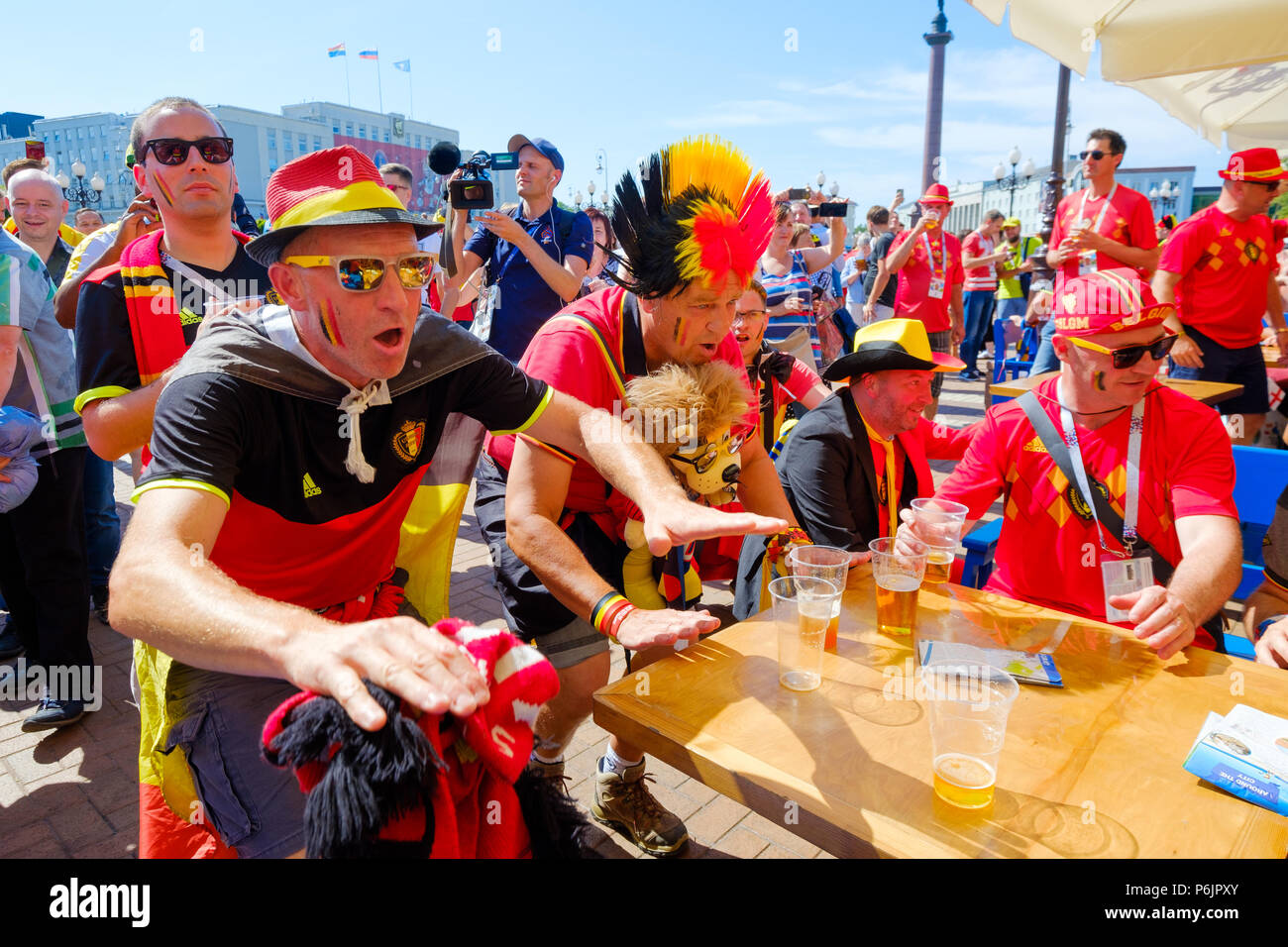 Football fans support teams on the street of the city on the day of the