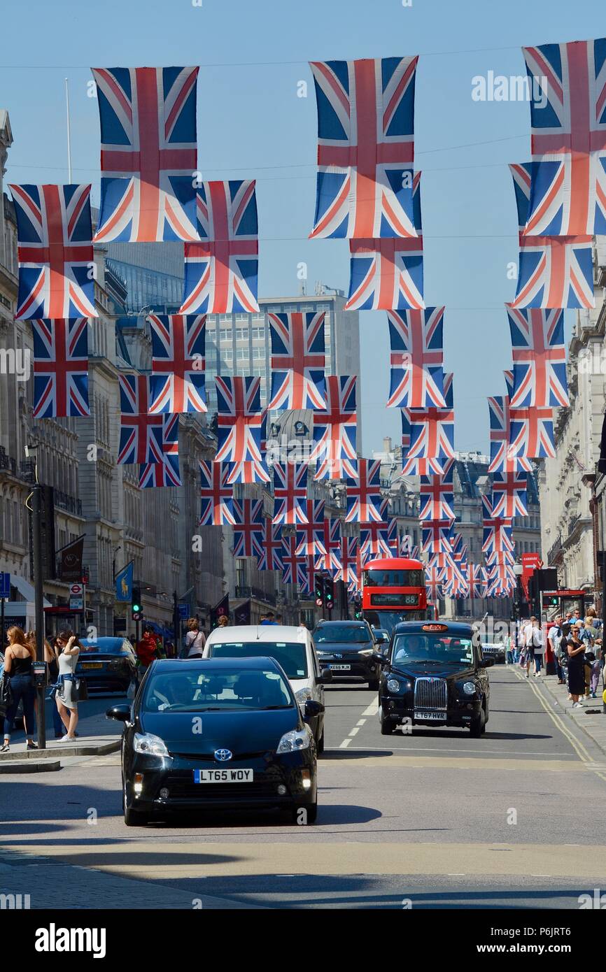 United Kingdom union flags above the Piccadilly area of London, City of Westminster, UK during the wedding of Prince Harry and Meghan Markle. Stock Photo