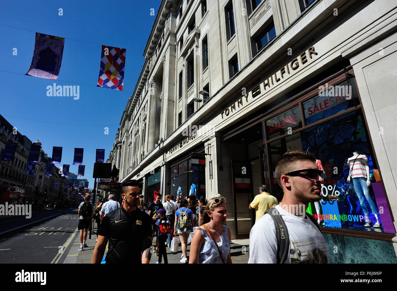 Tommy Hilfiger and people shopping on Regent Street, UK Stock Photo - Alamy