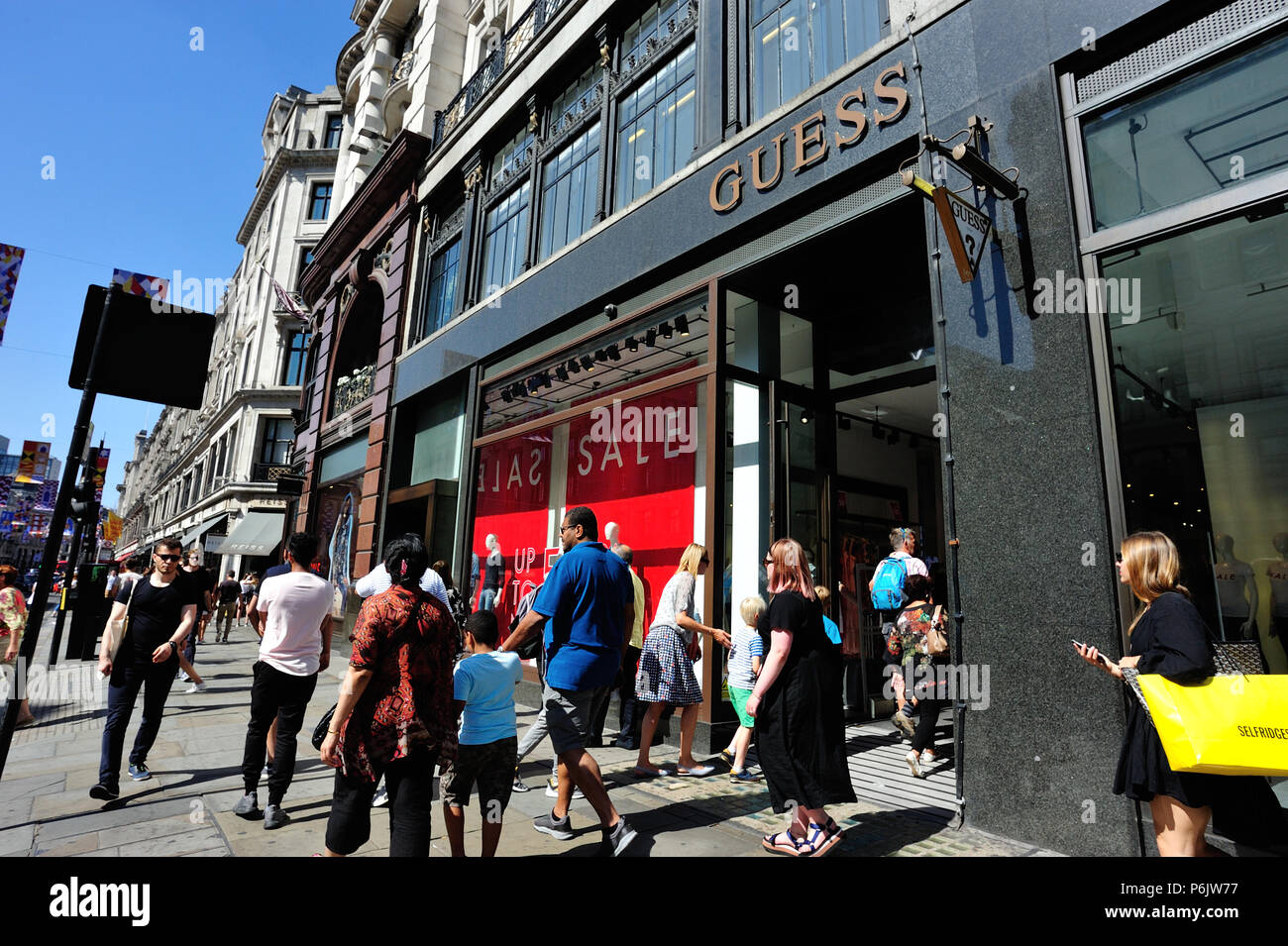 GUESS store and people shopping on Regent Street, London, England, UK Stock  Photo - Alamy