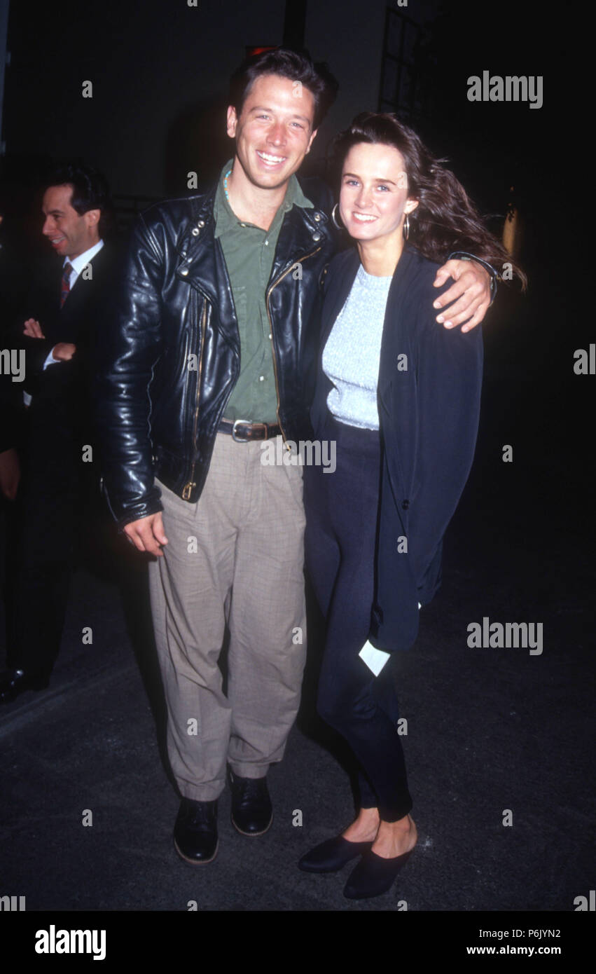 LOS ANGELES, CA - DECEMBER 14: (L-R) Actor Brian Wimmer and guest attend a  premiere on December 14, 1991 in Los Angeles, California. Photo by Barry  King/Alamy Stock Photo Stock Photo - Alamy, image size:851x1390