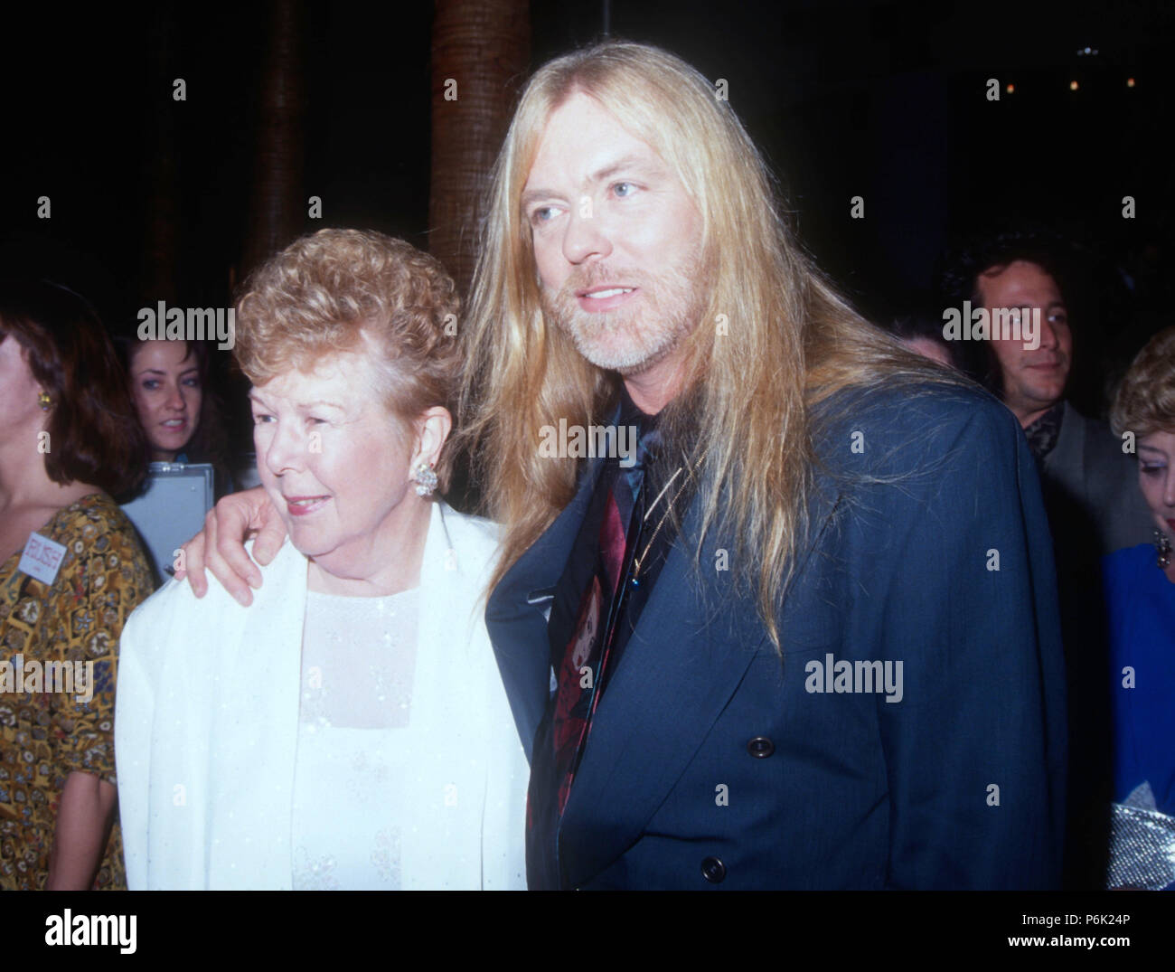 HOLLYWOOD, CA DECEMBER 18 (LR) Geraldine Alice and son singer