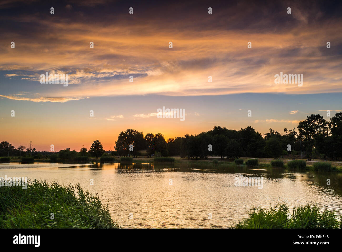 A beautiful sky illuminated by the setting sun Stock Photo