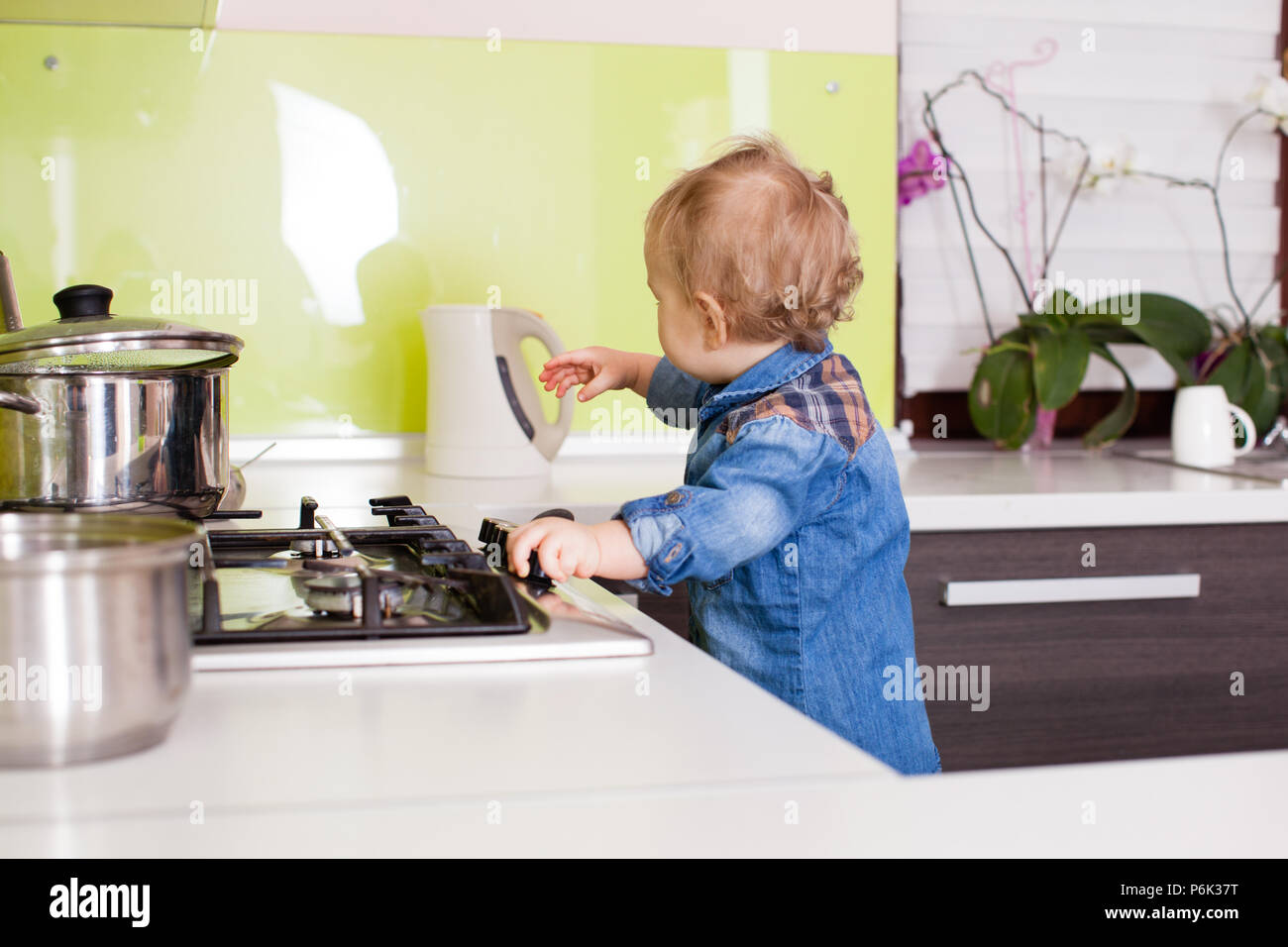 Child pot stove hi-res stock photography and images - Alamy