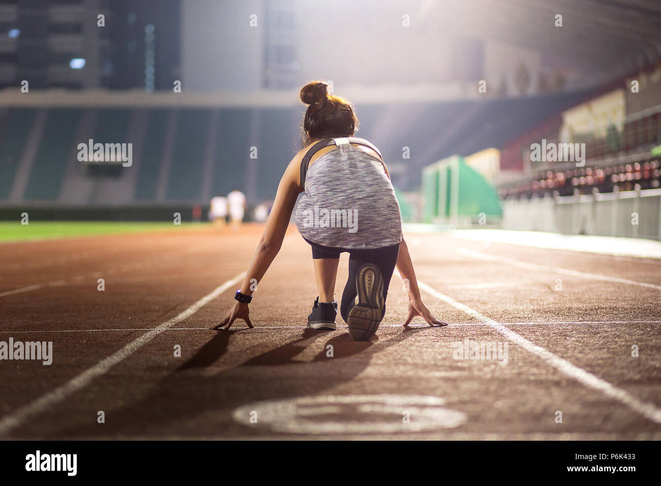 Female sprinter starting hi-res stock photography and images - Alamy