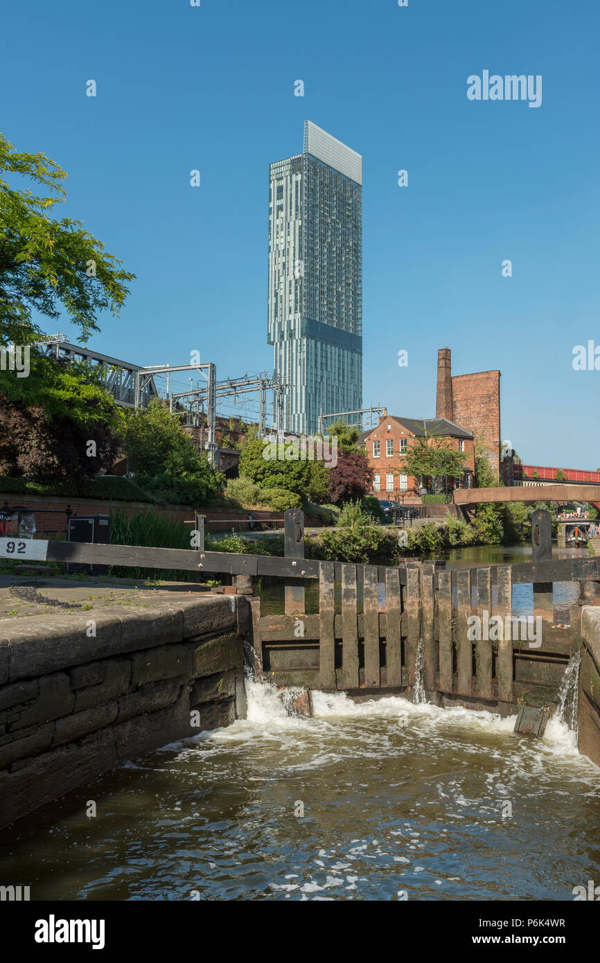 A general view of the Castlefield area of Manchester with lock 92 of the canal open in the foreground. Stock Photo