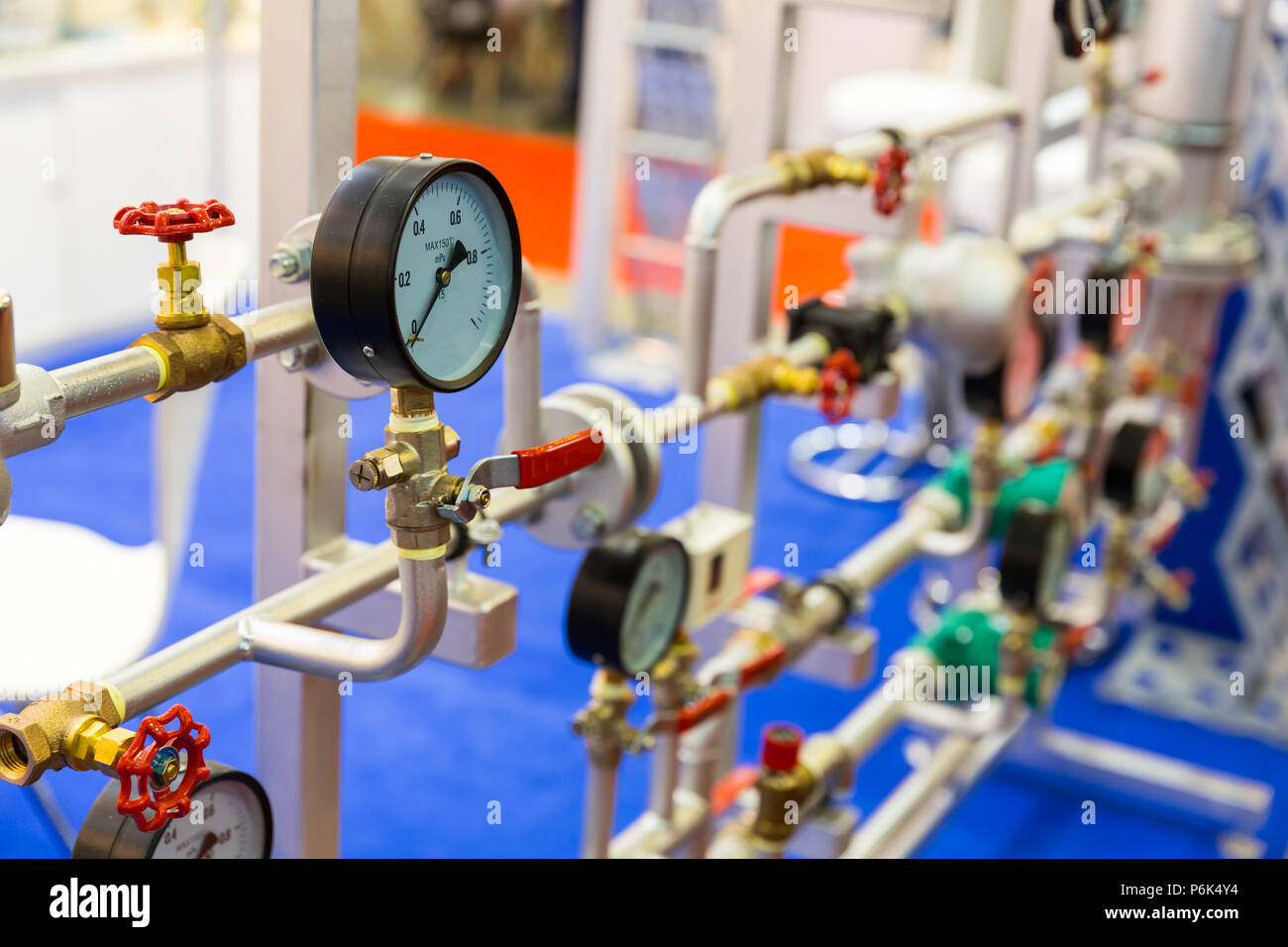 Pressure gauge, valves on water pipeline, heat circuit. Thermal and