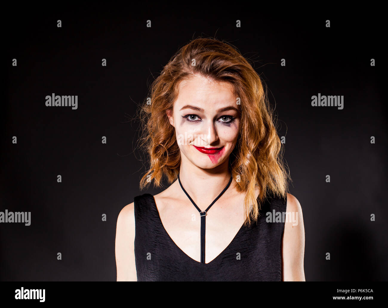 Drunk red-haired young woman with a smeared make-up Stock Photo - Alamy