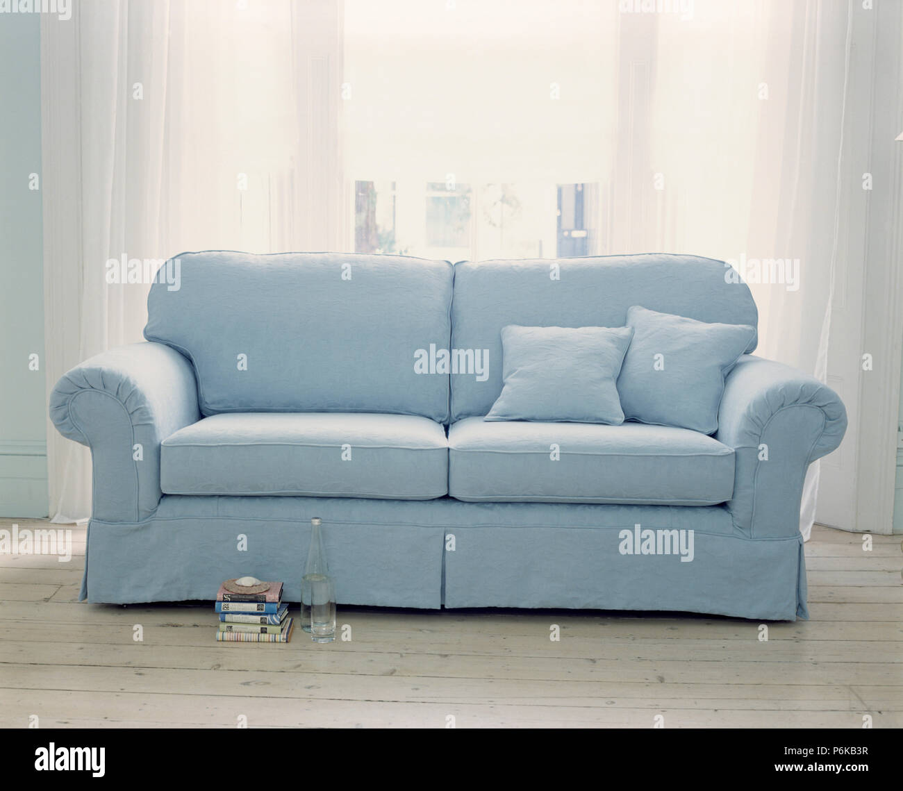 Close up of pale blue sofa Stock Photo Alamy