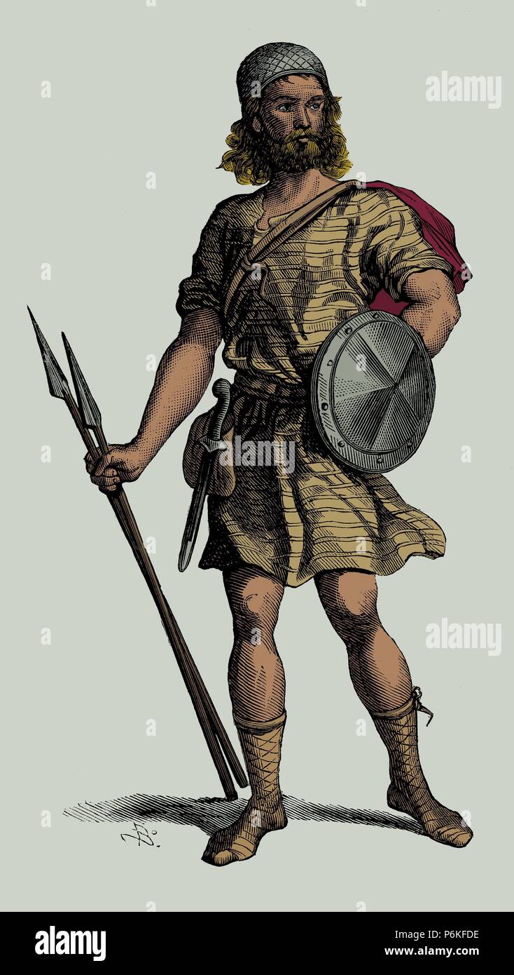 Indumentaria y armas de un guerrero almogávar en el siglo XIII. Grabado de 1880, coloreado. Stock Photo