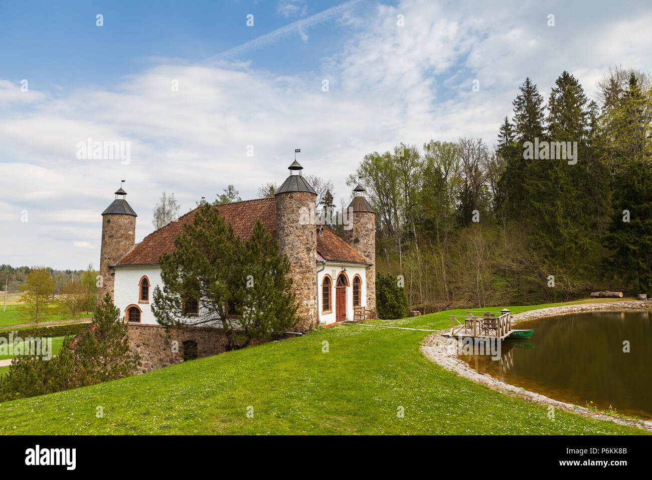 Wine distillery, interesting stone building with big chimneys. Heimtali, Estonia. Stock Photo