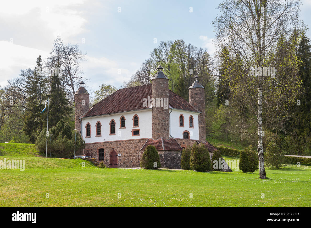 Wine distillery, interesting stone building with big chimneys. Heimtali, Estonia. Stock Photo