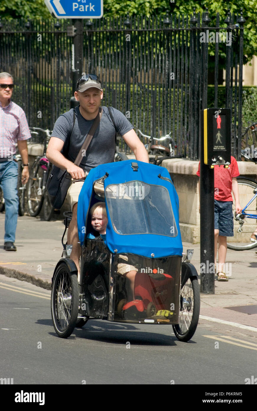 Farther & Child Riding Bike Stock Photo