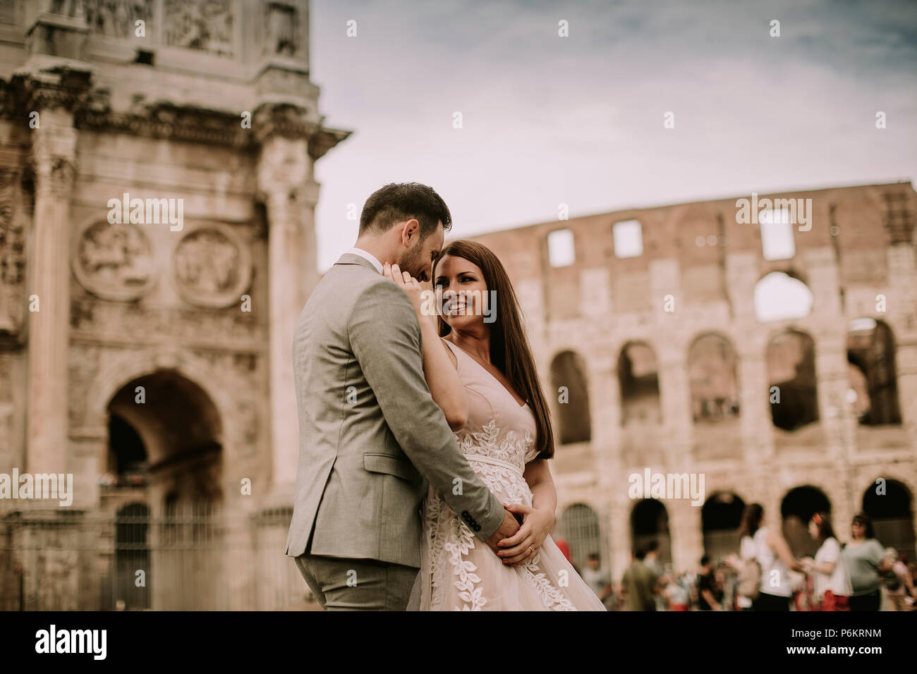 Young wedding couple in love in Rome, Italy Stock Photo