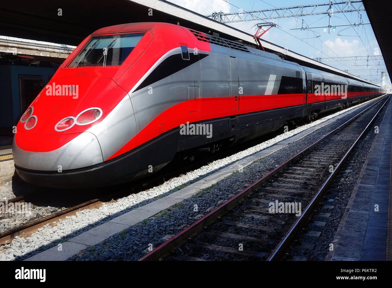 High speed red modern Italian train stop Roma Termini station Rome ...