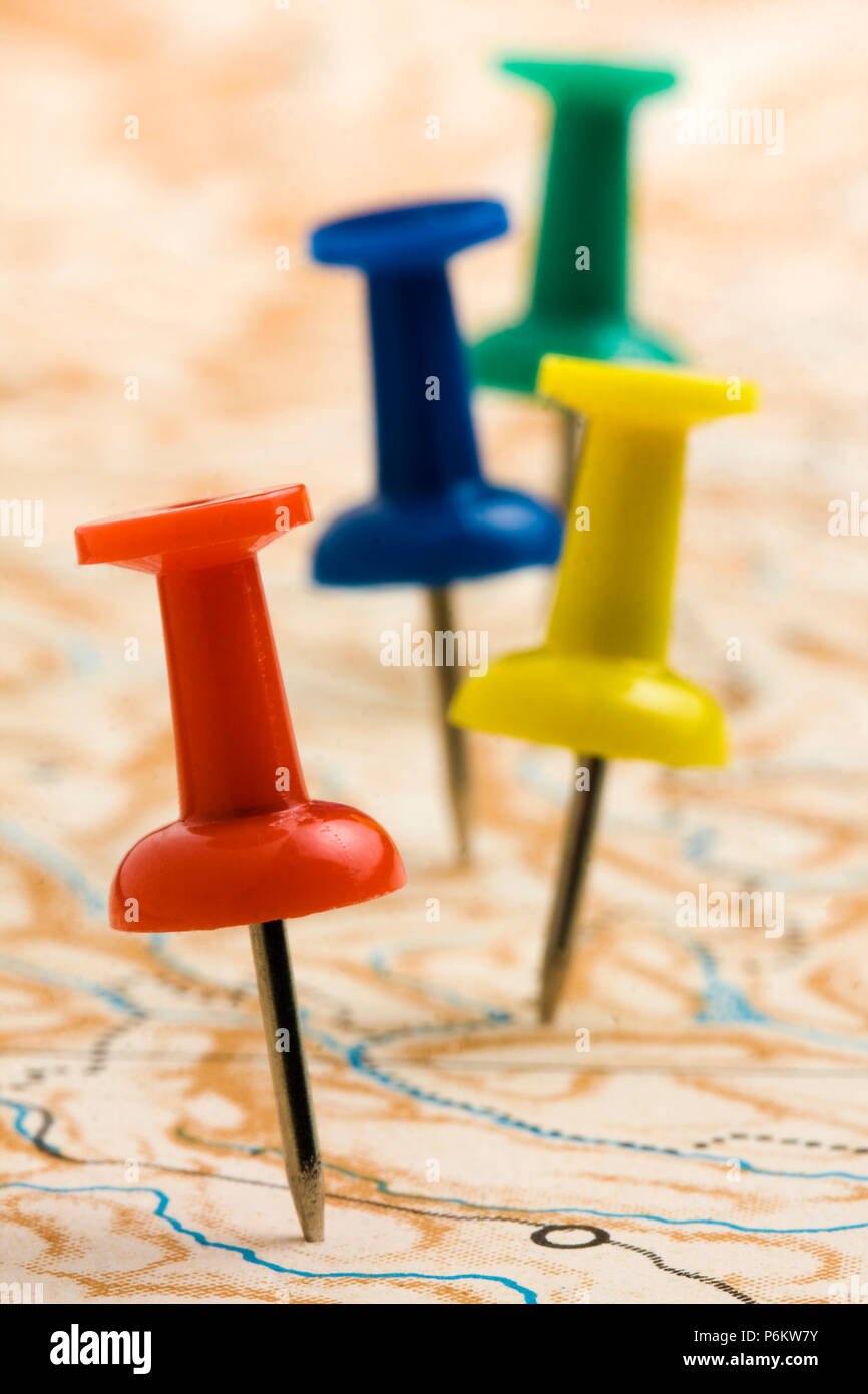 Pushpins on nameless geographic map Stock Photo