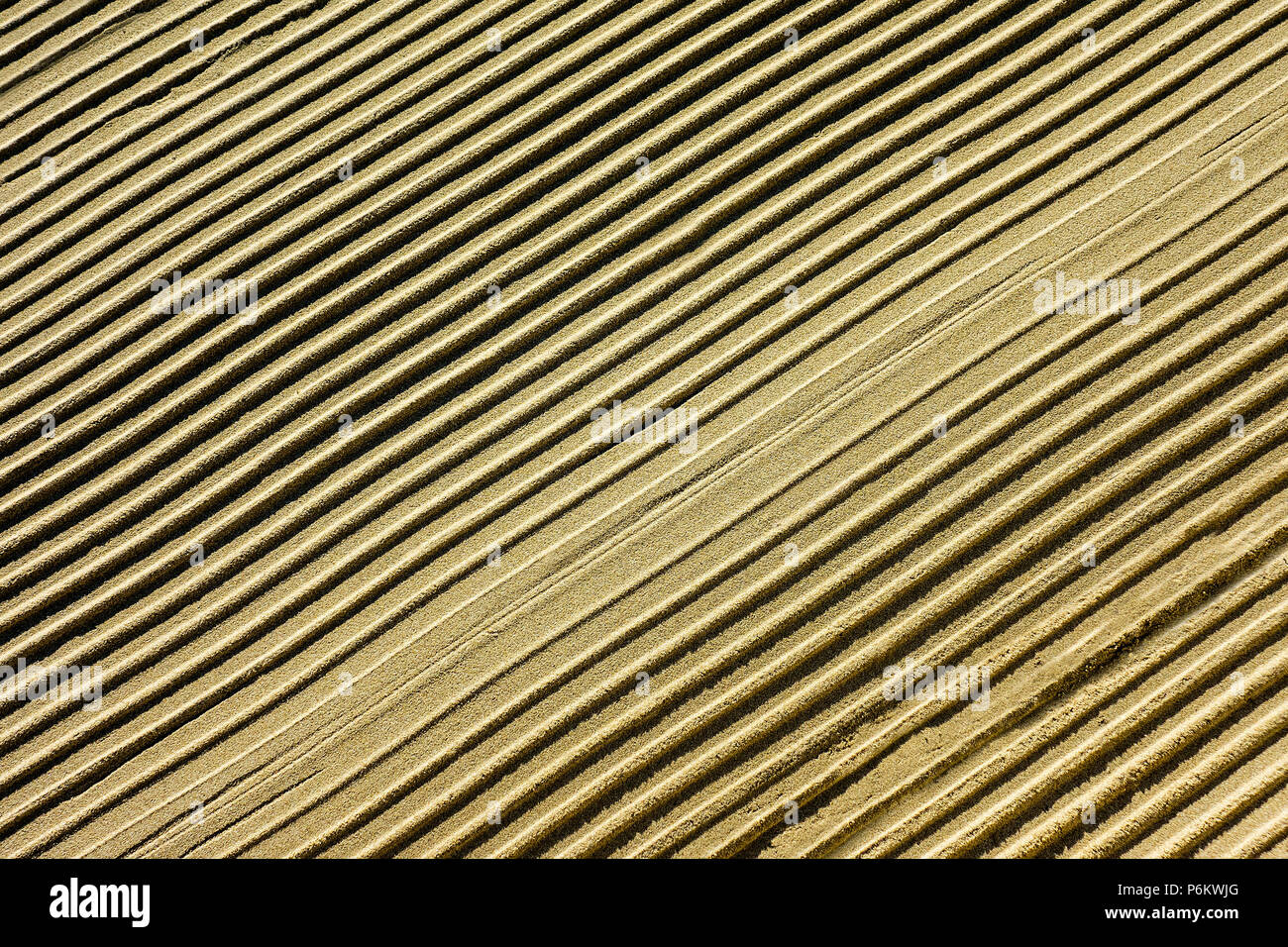 Diagonal parallel ripples in the sand Stock Photo - Alamy