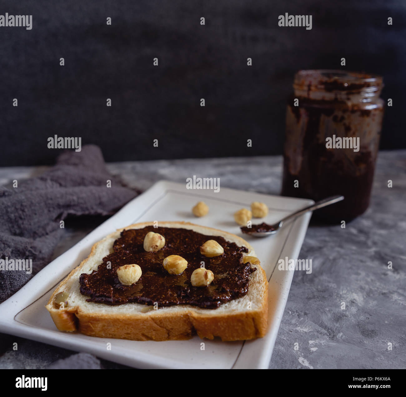 Chocolate Hazelnut Spread with a Slice of Bread Stock Photo Alamy
