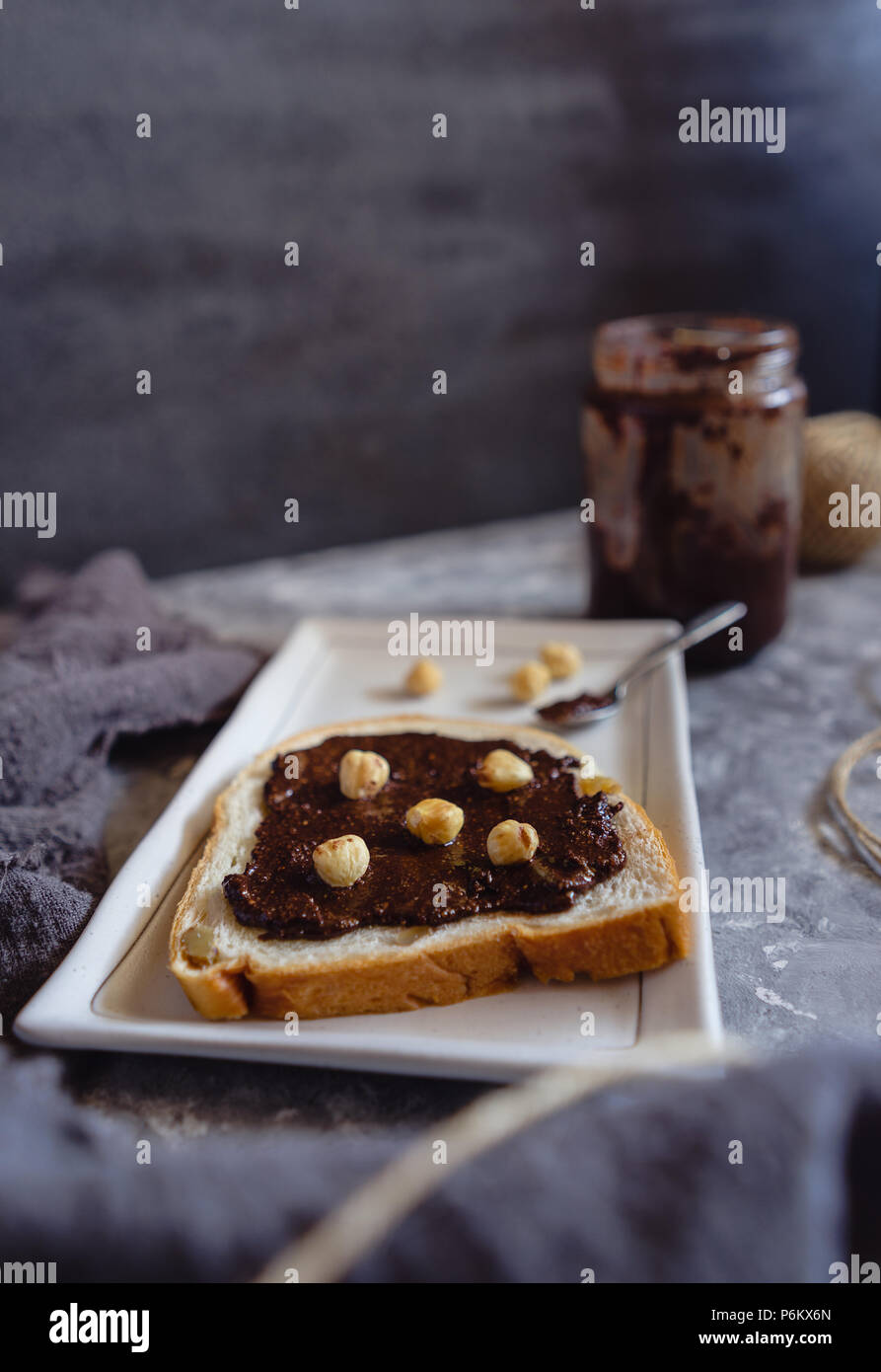 Chocolate Hazelnut Spread with a Slice of Bread Stock Photo Alamy