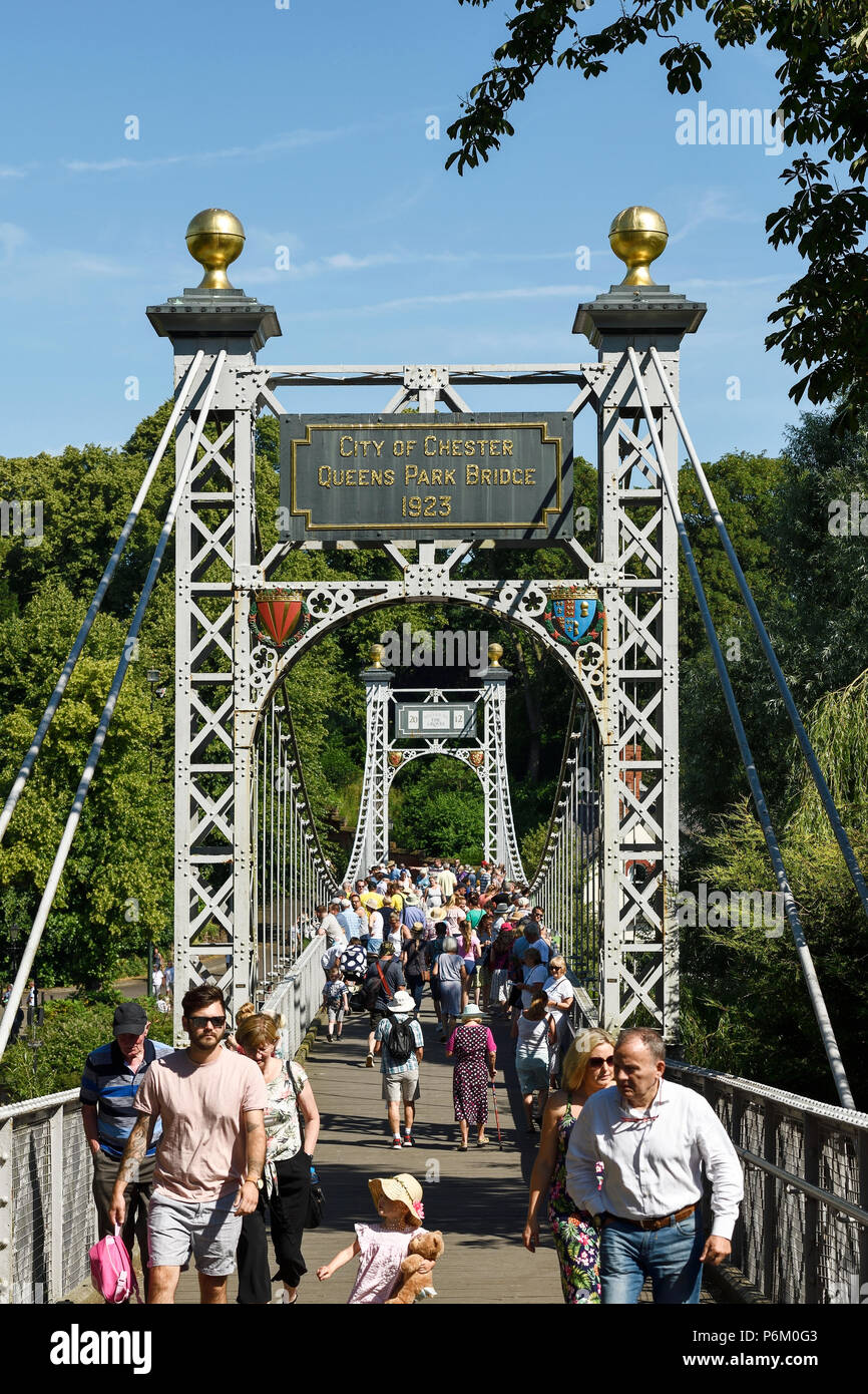 The Queens Park suspension bridge over the River Dee at The Groves in
