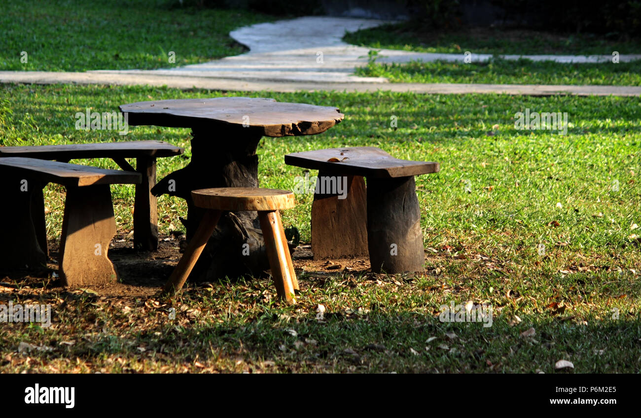 wooden table and chair in the beautiful garden Stock Photo