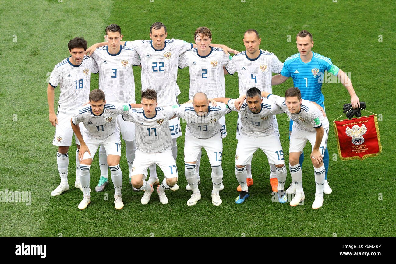 Russia team (L-R, back to front) Yuri Zhirkov, Ilya Kutepov, Artem Dzyuba, Mario Fernandes, Sergei Ignashevich, goalkeeper Igor Akinfeev, Roman Zobnin, Aleksandr Golovin, Fyodor Kudryashov, Aleksandr Samedov, and Daler Kuzyayev prior to kick-off during the FIFA World Cup 2018, round of sixteen match at The Luzhniki Stadium, Moscow. Stock Photo