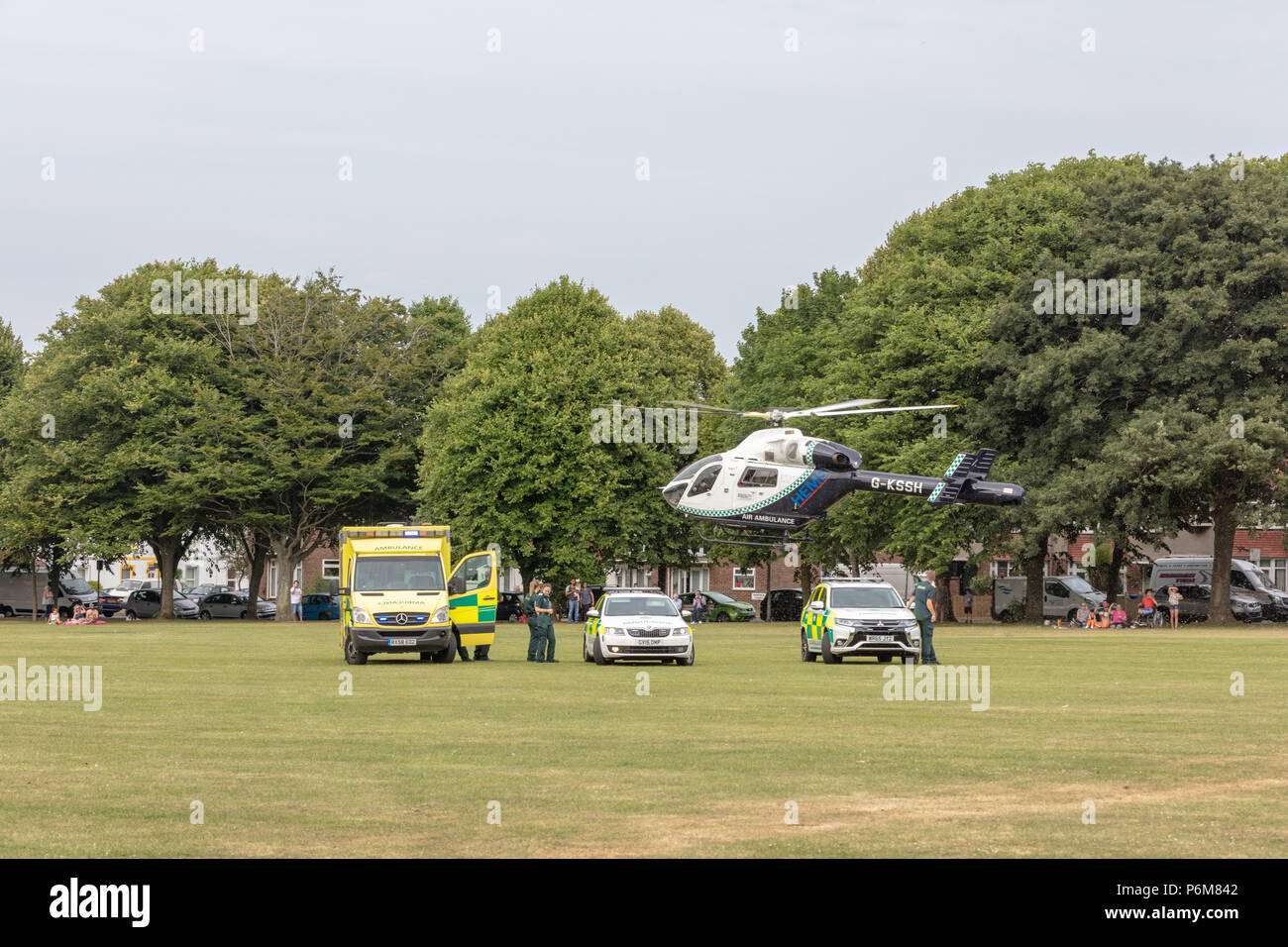 Worthing, Sussex, UK. 1st Jul, 2018. Air Ambulance lifts off from Victoria Park with a casualty who had been transferred from an ambulance that had arrived in the park by road.  Credit: Ian Stewart/Alamy Live News Stock Photo