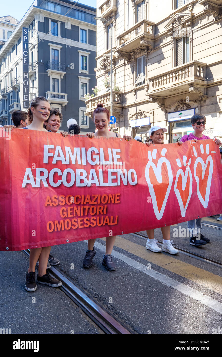 Milan, Italy. 30th Jun, 2018. Milano Pride 2018, manifestation of gay, lesbians, asexuals, bisexuals, intersexual and queer pride. People holding a band during the start of the parade. Milan, Italy. June 30, 2018. Credit: Gentian Polovina/Alamy Live News Stock Photo
