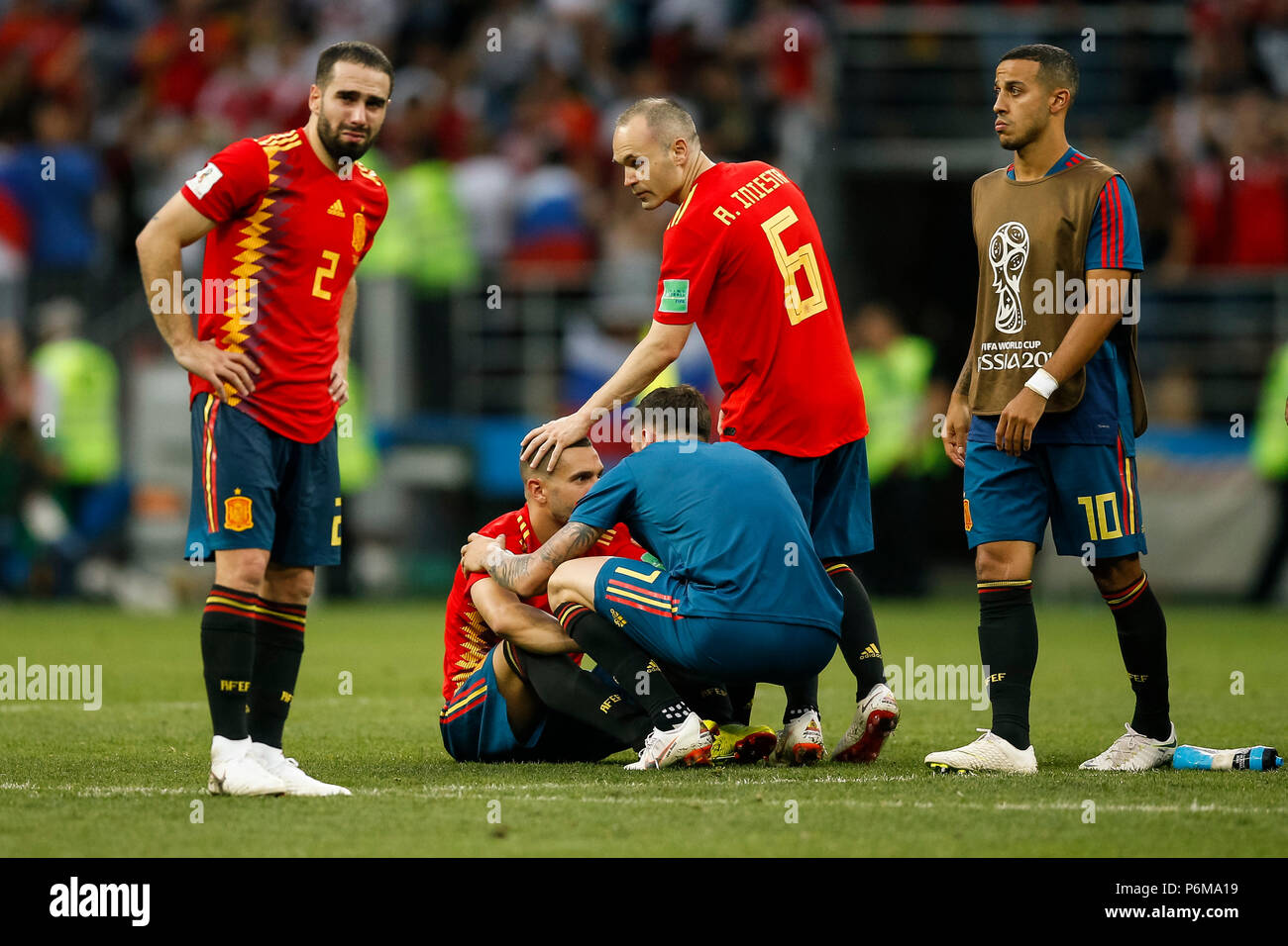 Moscow, Russia. 1st July, 2018. Andres Iniesta of Spain consoles Koke of Spain after the 2018 FIFA World Cup Round of 16 match between Spain and Russia at Luzhniki Stadium on July 1st 2018 in Moscow, Russia. Credit: PHC Images/Alamy Live News Stock Photo