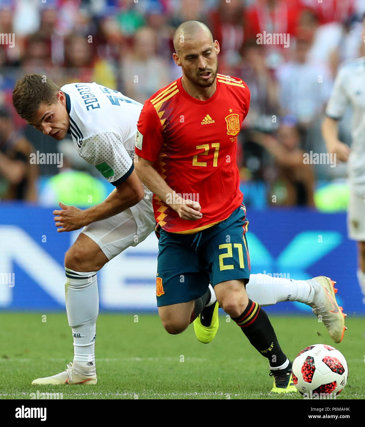 (180701) -- MOSCOW, July 1, 2018 (Xinhua) -- David Silva (R) of Spain competes during the 2018 FIFA World Cup round of 16 match between Spain and Russia in Moscow, Russia, July 1, 2018. Russia won 5-4 (4-3 in penalty shootout) and advanced to the quarter-final. (Xinhua/Yang Lei) Stock Photo