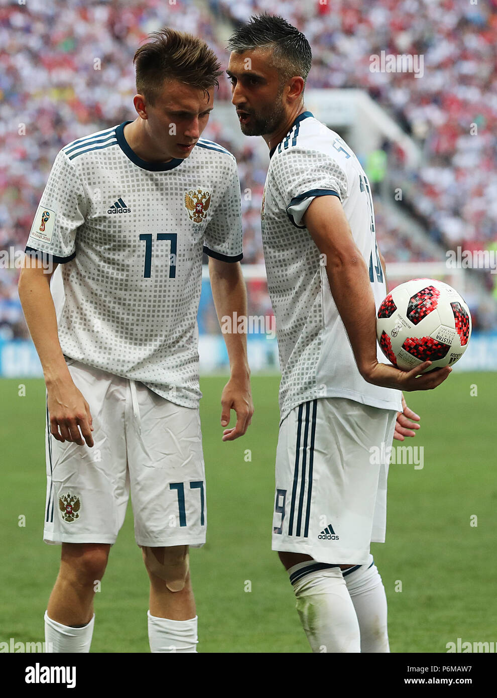 (180701) -- MOSCOW, July 1, 2018 (Xinhua) -- Russia's Alexander Samedov (R) talks with Aleksandr Golovin during the 2018 FIFA World Cup round of 16 match between Spain and Russia in Moscow, Russia, July 1, 2018. Russia won 5-4 (4-3 in penalty shootout) and advanced to the quarter-final.(Xinhua/Yang Lei) Stock Photo