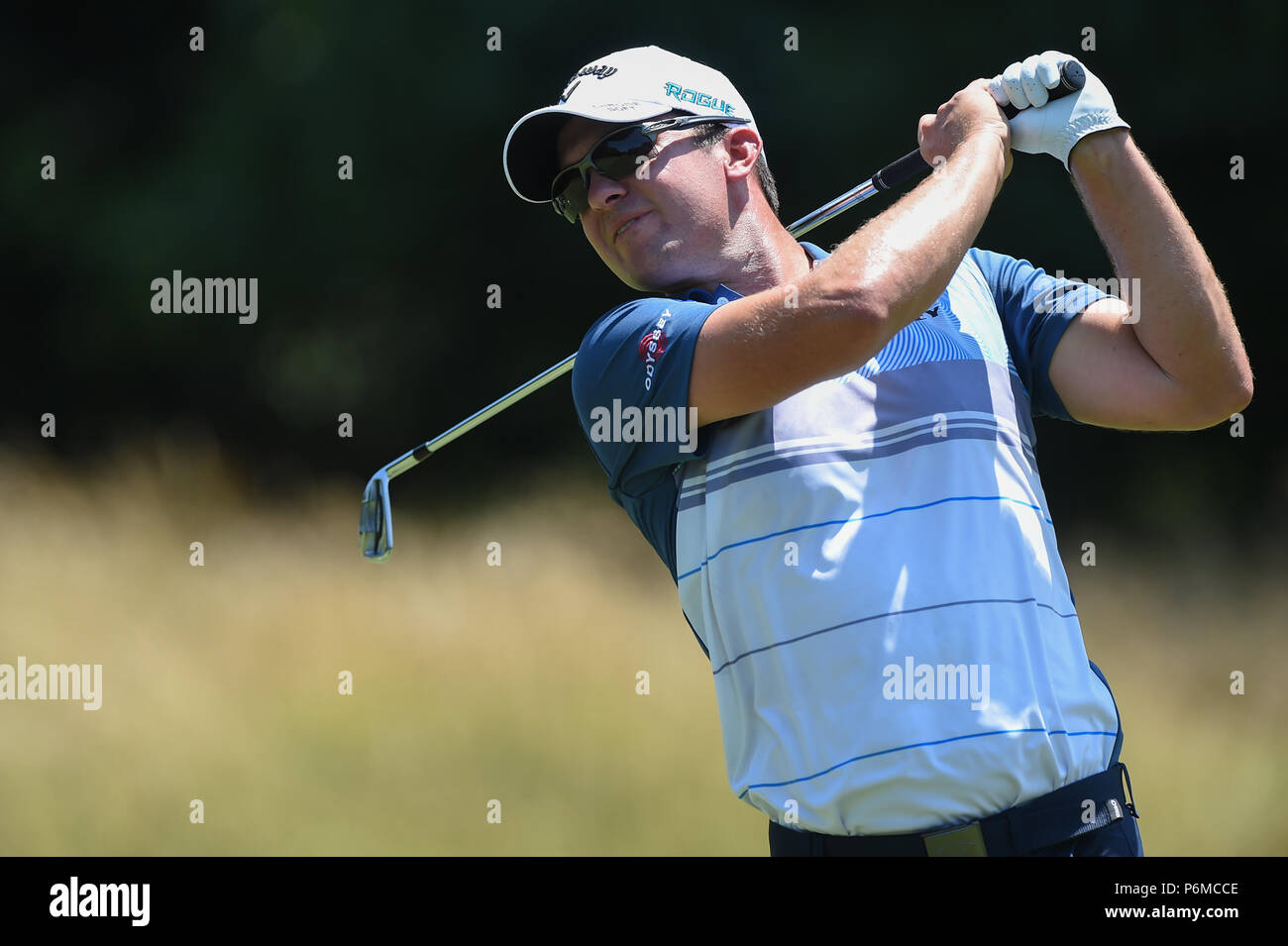 JULY 01, 2018 - Ryan Blaum (USA) tees off at the par three third hole during the final round at the 2018 Quicken Loans National at the Tournament Players Club in Potomac MD. Stock Photo