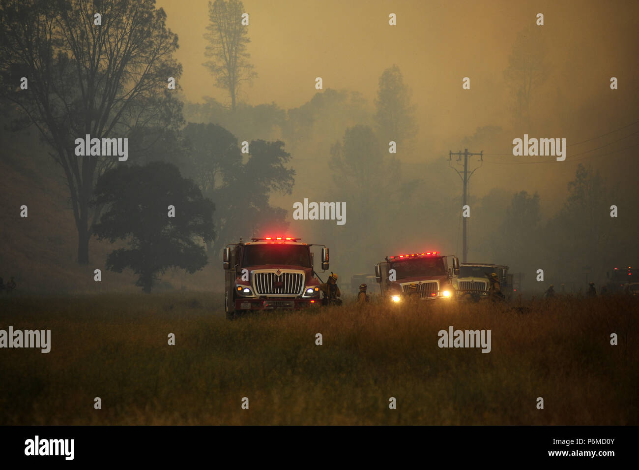 Clearlake Oaks, California, USA. 1st July, 2018. The Pawnee Fire in Lake County showed increased fire activity over the weekend. Red Flag warnings were in effect and strong winds and low humidity contributed to the increased fire behavior. Credit: Neal Waters/ZUMA Wire/Alamy Live News Stock Photo
