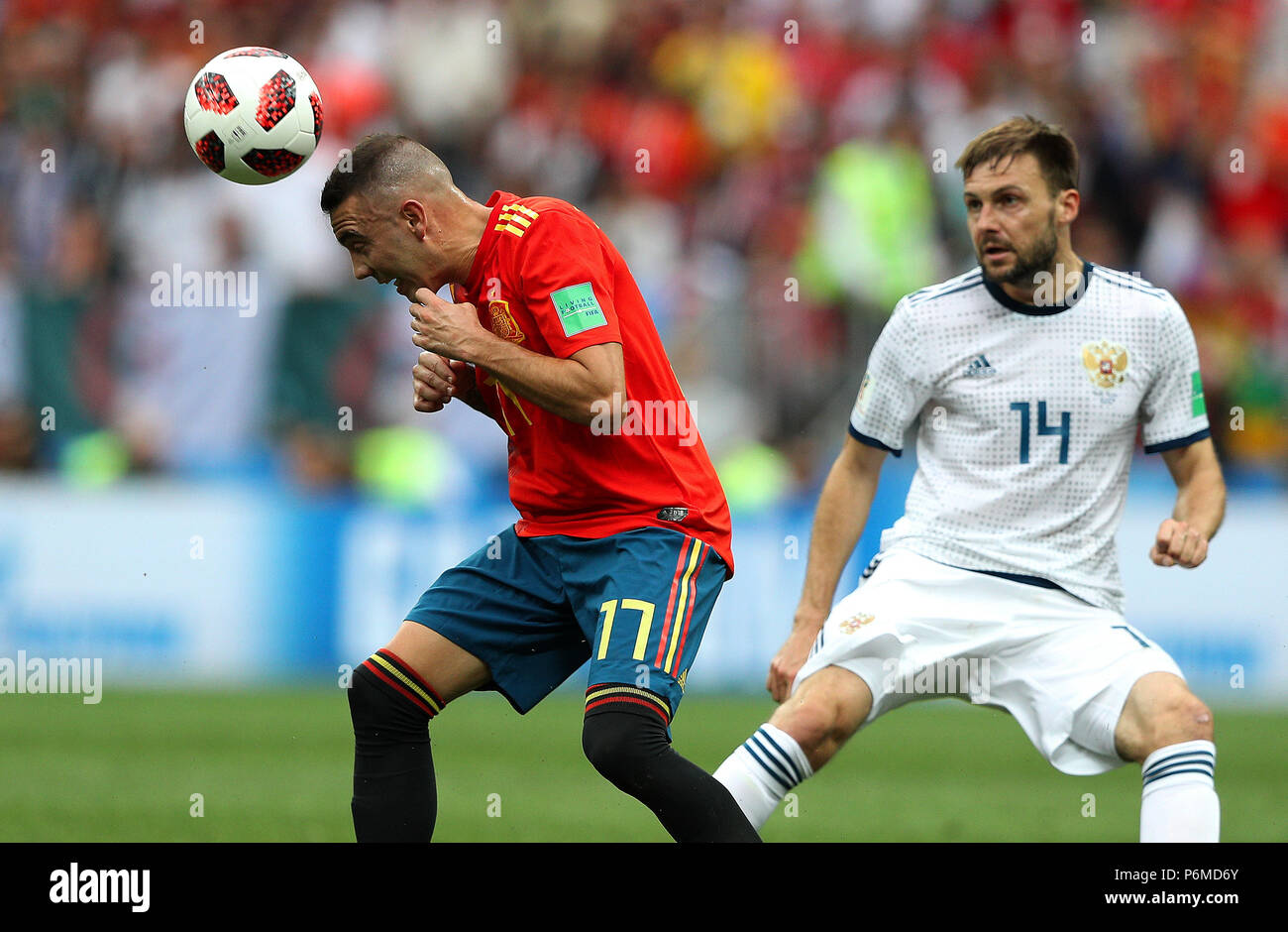 Moscow, Russia. 1st July, 2018.  Iago ASPAS of Spain and Vladimir GRANAT of Russia during the match between Spain and Russia, valid for the eighth-finals of the 2018 World Cup held at the Luzhniki Stadium in Moscow, Russia. (Photo: Rodolfo Buhrer/La Imagem/Fotoarena) Credit: Foto Arena LTDA/Alamy Live News Stock Photo