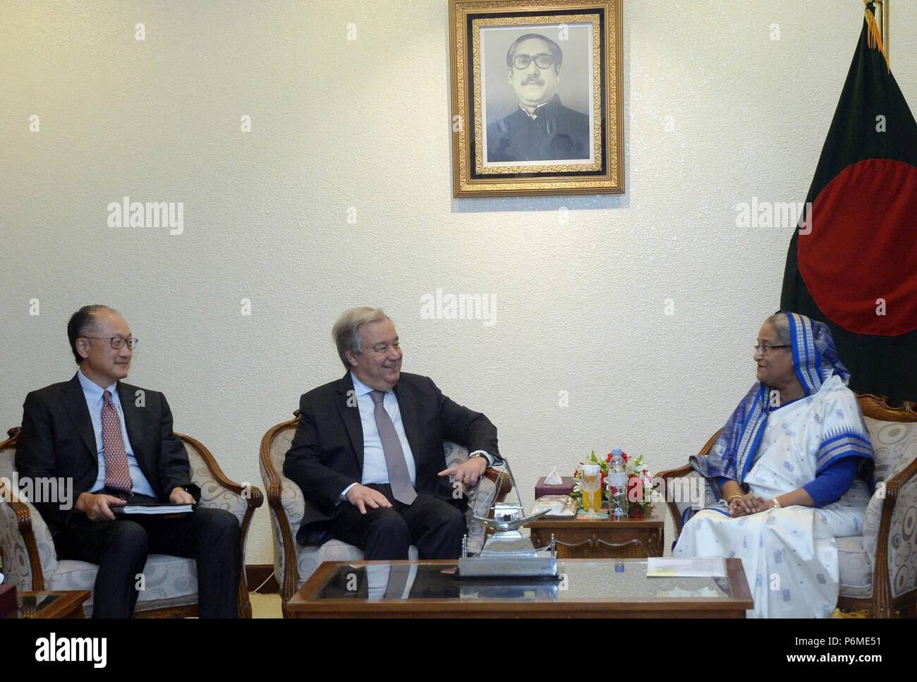 Dhaka. 1st July, 2018. Bangladeshi Prime Minister Sheikh Hasina (R) meets with United Nations Secretary-General Antonio Guterres (C) and World Bank President Jim Yong Kim in Dhaka, Bangladesh, on July 1, 2018. U.N. Secretary-General Antonio Guterres arrived here early Sunday in a joint visit with World Bank President Jim Yong Kim to assess the needs for the nearly one million Rohingya refugees driven from their homes in Myanmar. Credit: Xinhua/Alamy Live News Stock Photo