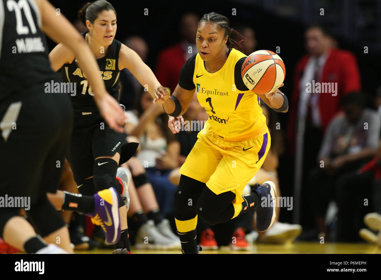 LOS ANGELES, CA - JULY 01: Los Angeles Sparks guard Odyssey Sims (1) brings the ball down court during a WNBA game between the Los Angeles Sparks and the Las Vegas Aces on July 01, 2018, at Staples Center, in Los Angeles, CA. Jordon Kelly/CSM Stock Photo