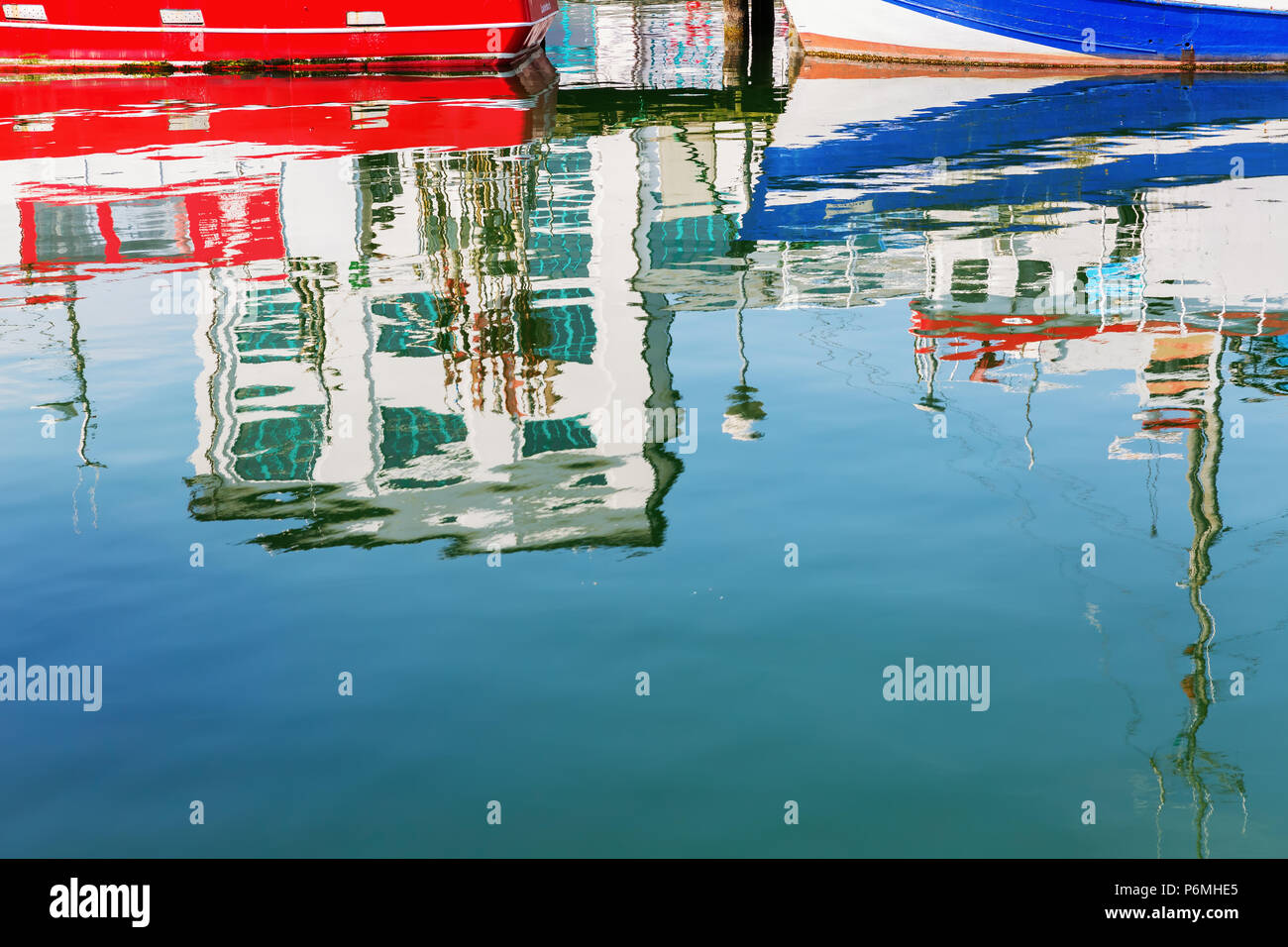 picture of reflections of boats and houses in a harbor Stock Photo - Alamy