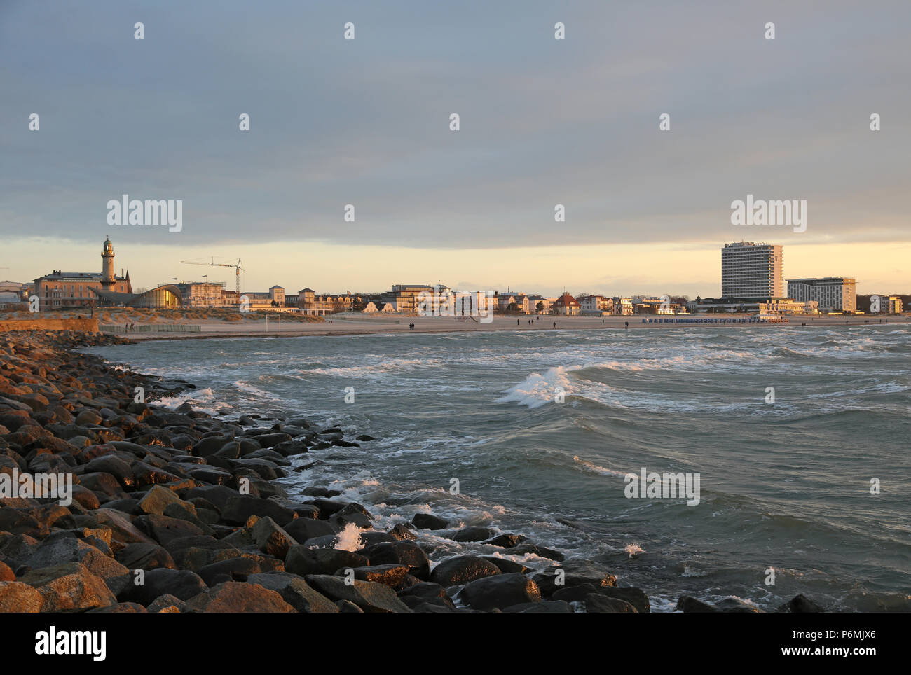 Warnemuende, view from the west pier on the city in the evening Stock Photo