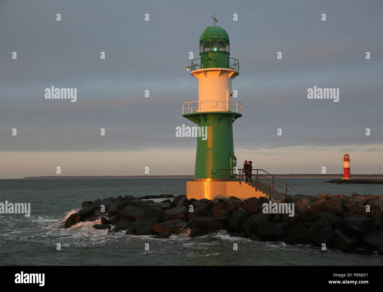 Warnemuende, lighthouses on the West and Ostmole in the evening light Stock Photo