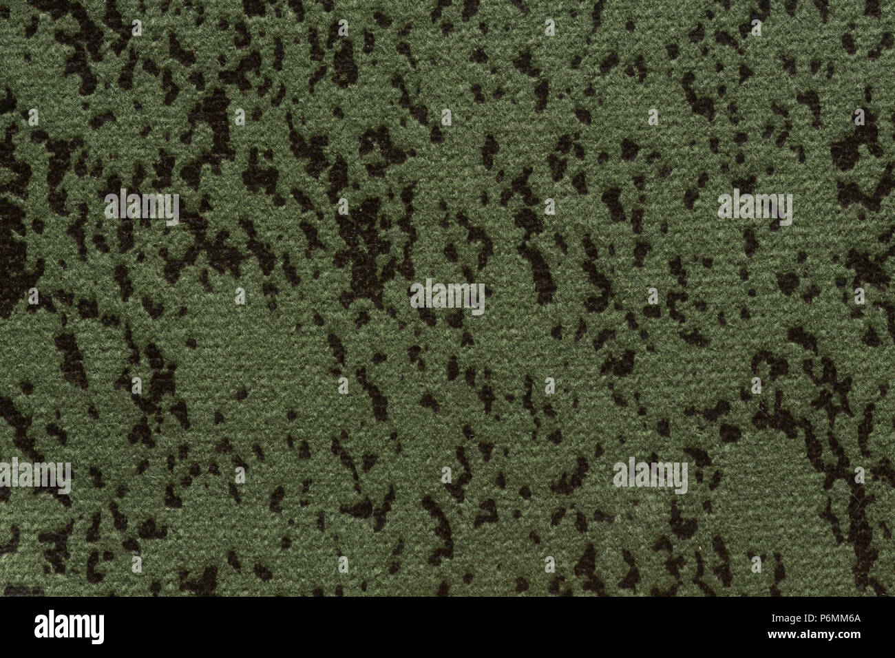 Dark saturated green textile background. High resolution photo. Stock Photo