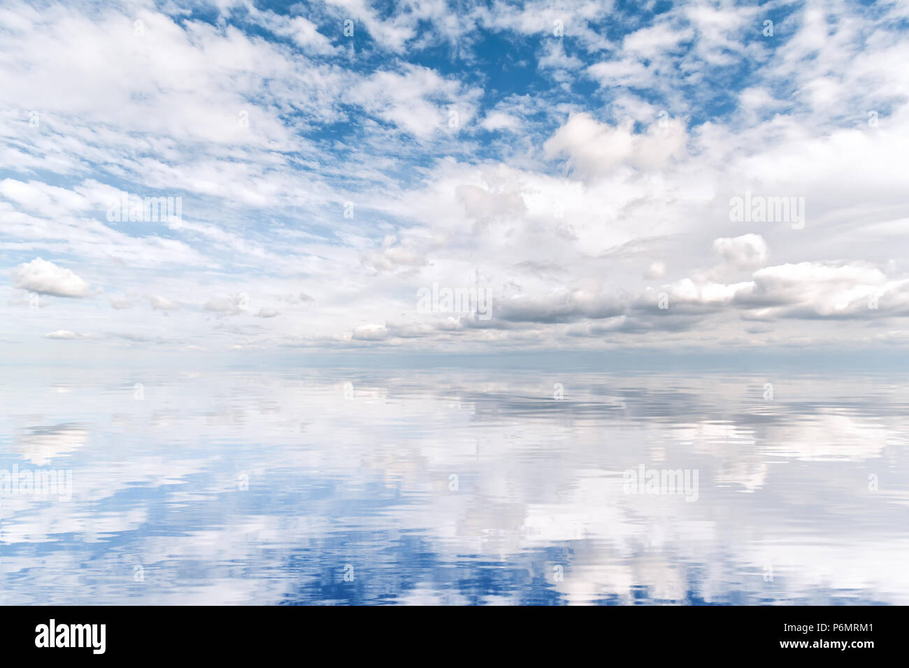 Beautiful water reflection of a spectacular cloudscape Stock Photo