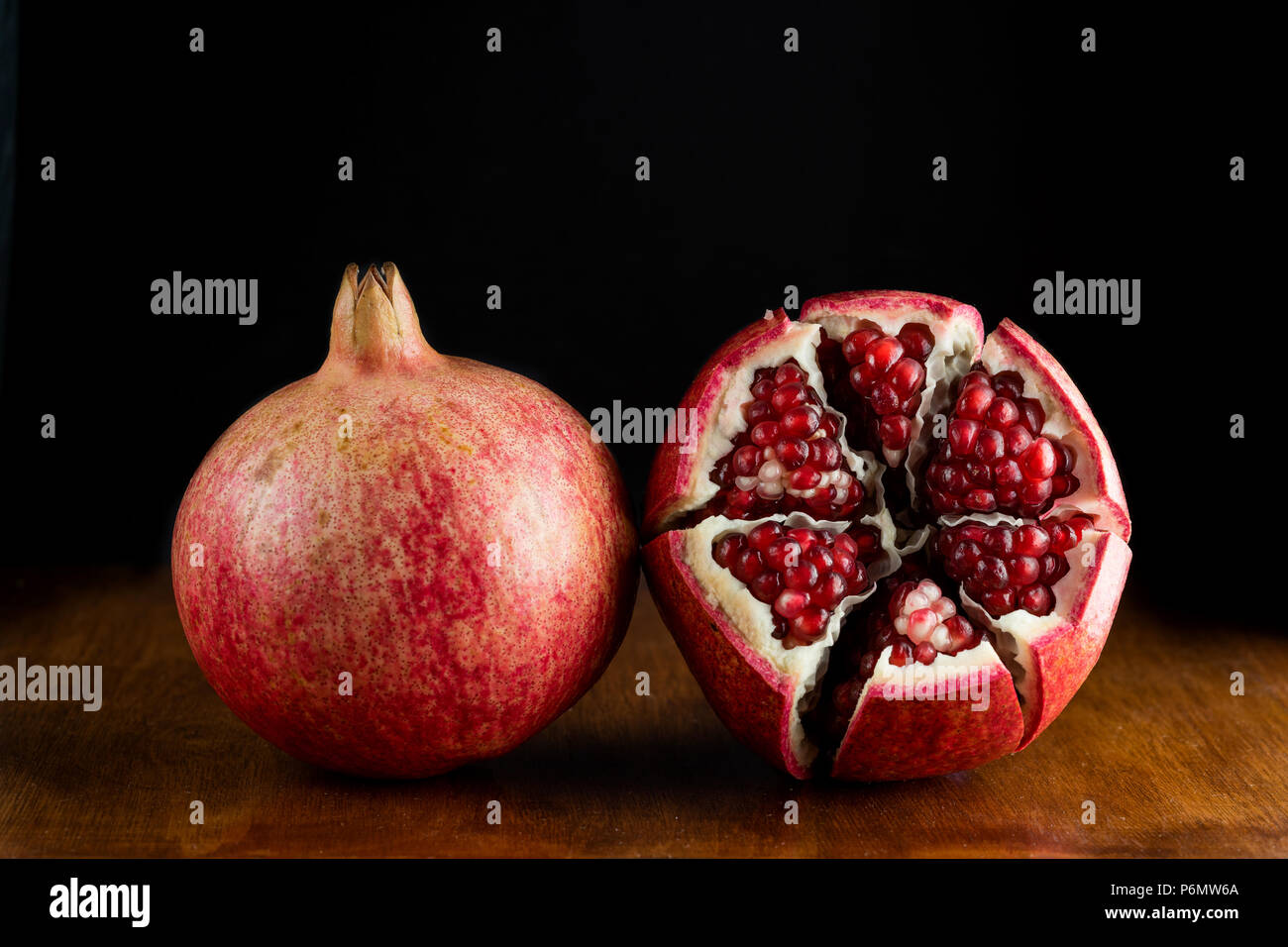 Red juicy pomegranate fruit Stock Photo