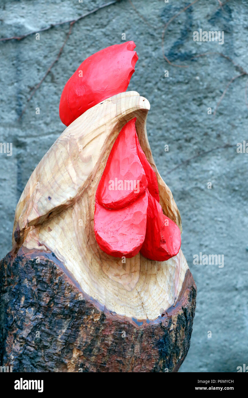 Sant Orso fair. Artists and craftsmen from Valle dÕAosta proudly display their works.  Rooster Carving. Aosta. Italy. Stock Photo