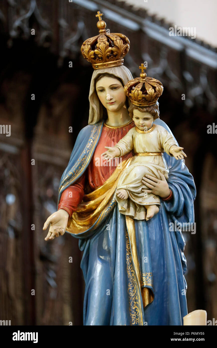 Virgin and Child. Wood carven.   Cathedral of the Assumption of Mary and Saint John the Baptist. Aosta. Italy. Stock Photo