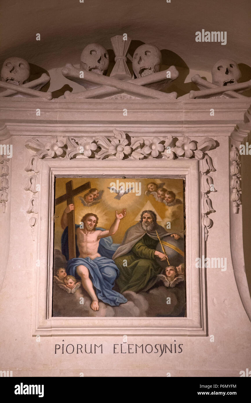 Painting in Uggiano la Chiesa church, Italy. The Holy Trinity. Stock Photo
