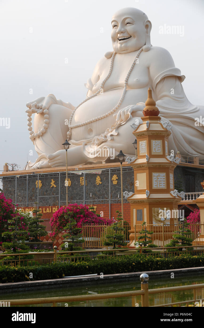 Vinh Trang Buddhist temple.  Big Happy Buddha statue.  My Tho. Vietnam. Stock Photo