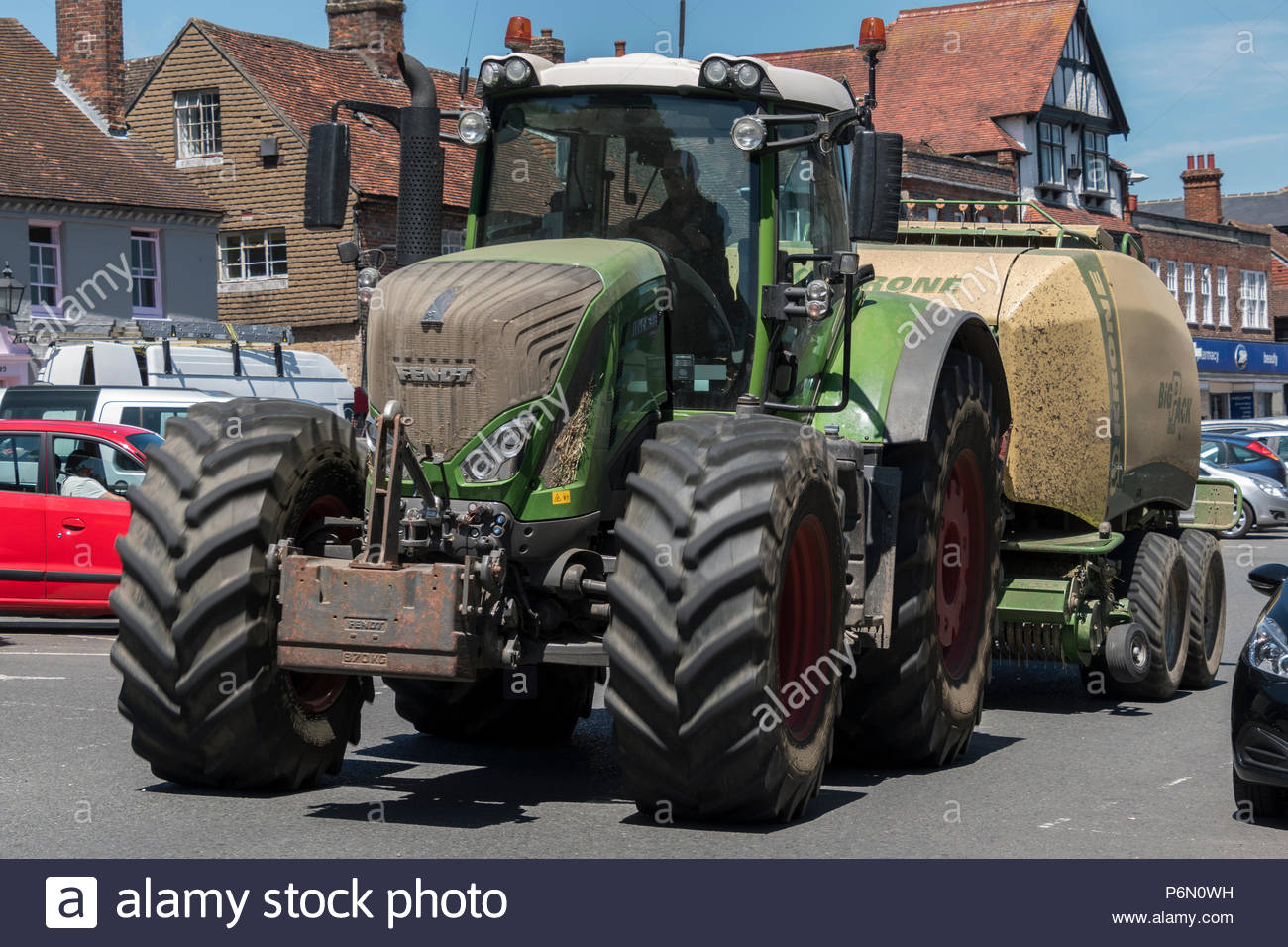 Farmer Driving A Tractor High Resolution Stock Photography and Images