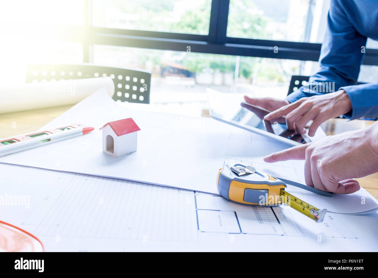 Team of engineers working together in a architect office