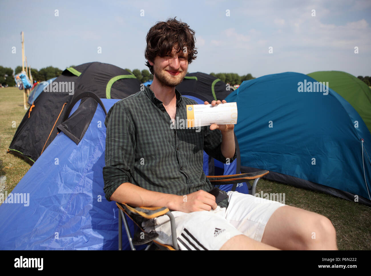 Darius Platt-Vowles from Gloucestershire is first in the queue ahead of the 2018 Wimbledon Championships at The All England Lawn Tennis and Croquet Club, Wimbledon.at the All England Lawn Tennis and Croquet Club, Wimbledon. Stock Photo
