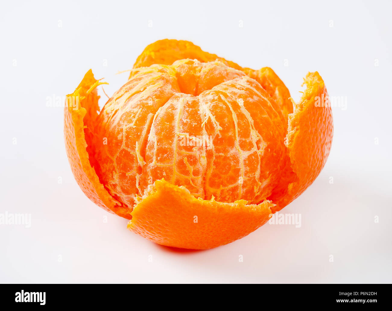 peeled ripe tangerine on white background Stock Photo